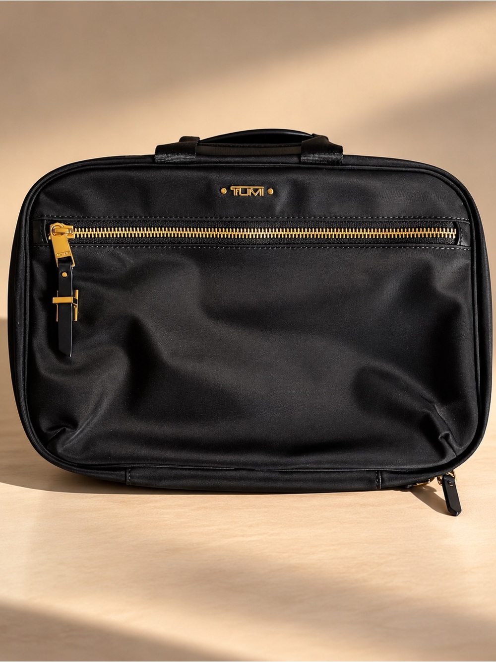 TUMI Voyageur Madina Cosmetic Hanging Toiletry Bag Black Gold Hardware